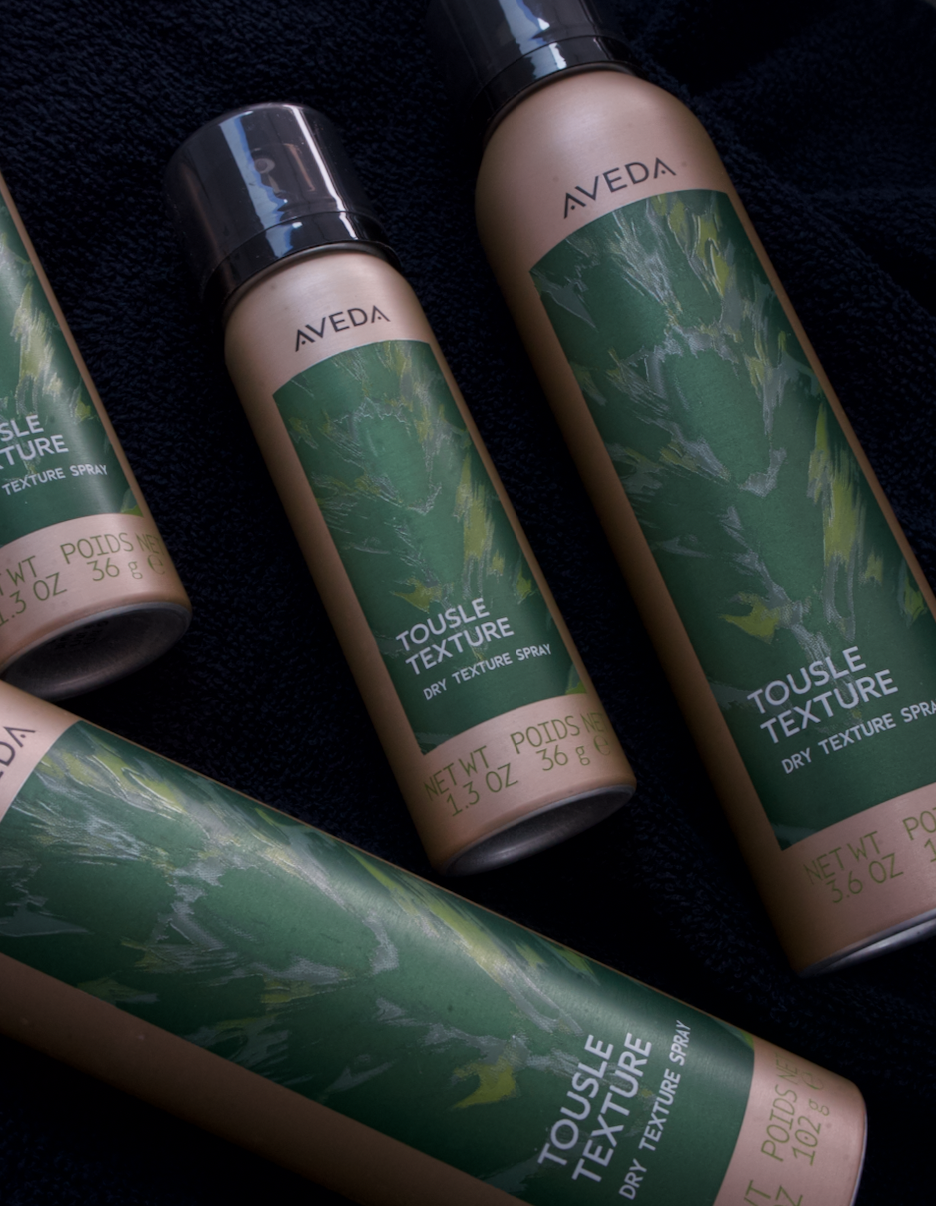 The final editorial hair look featuring soft, touchable separation and lasting volume achieved with Aveda Tousle Texture Dry Spray.